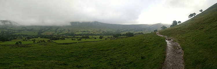 The sun pokes through the mist on the Pennine Way